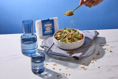 Zesty Ranch Protein Topping sprinkled over a savory salad bowl