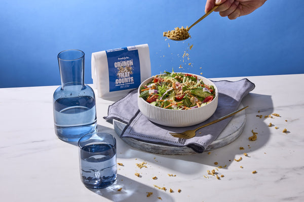 Zesty Ranch Protein Topping sprinkled over a savory salad bowl