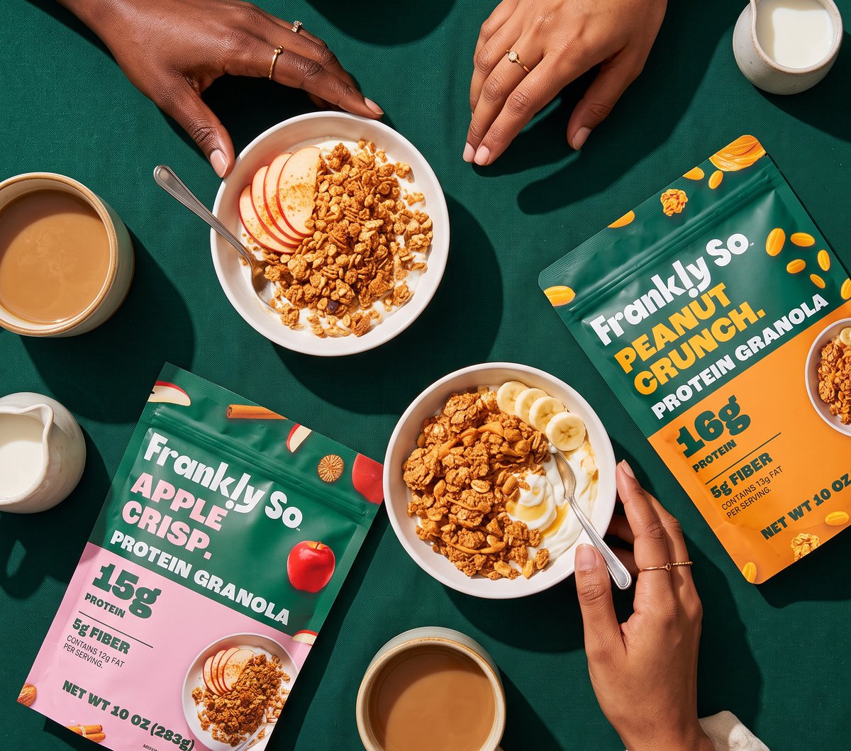 Apple Crisp and Peanut Crunch Protein Granola with breakfast bowls on a green table