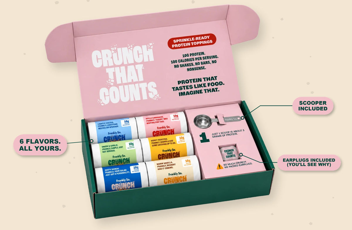 The Frankly So Starter Kit gift box, open, with six pouches, the Super Scooper and crunch earplugs